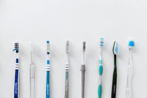 a close up picture of toohbrushes