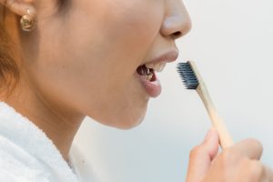a person brushing their teeth